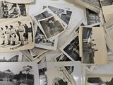 several old black and white photographs of men and women in uniform