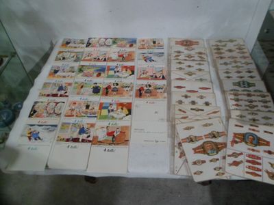 a table that has a lot of books on top of it