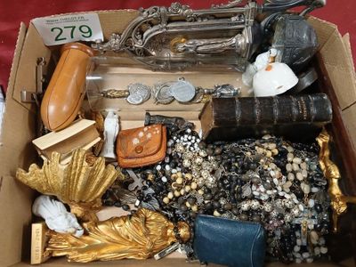 a box full of assorted items on a table