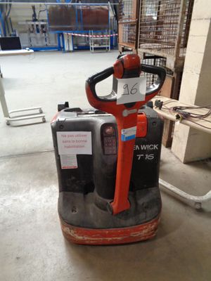 an image of a fork lifter in a warehouse