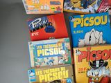 a lot of games that are sitting on a table