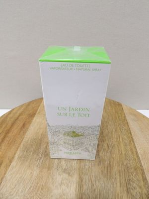a box of tea sitting on a wooden table