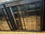 an image of a commercial refrigerator with glass doors
