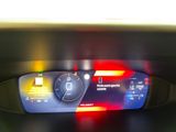 a digital display on the dashboard of a car