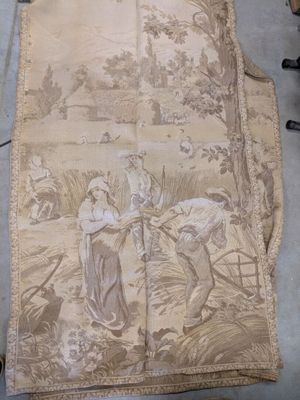 a large piece of fabric with a picture of a man and a woman on it