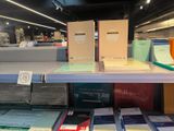 many books on the shelves in the store