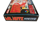 a box with a video game on it on a white surface