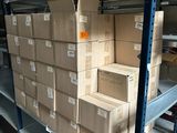 many boxes on the shelves in the warehouse