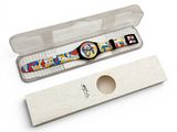 a watch that is in a case on a white surface