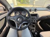 a steering wheel and dashboard of a car in a car showroom