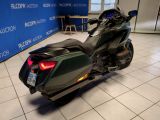 a picture of a motorcycle parked in a showroom