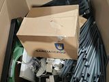 a cardboard box full of assorted items in it