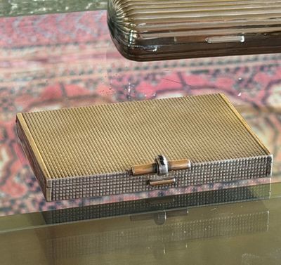 a box that is sitting on a glass table