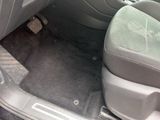 the interior of a car with the seat up and the front seat down