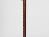 an image of a wooden candle holder with a candle on it