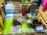 a shopping cart full of electronics and other items