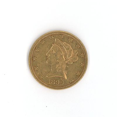 l'image d'une pièce d'or sur laquelle figure une tête de femme