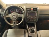 the interior of a car with a steering wheel, dashboard, and dashboard controls