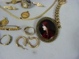 a picture of a necklace with a picture of a woman on it