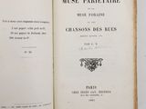 an open book with a picture of a butterfly on it