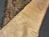 an image of a close up of a piece of cloth on a carpet