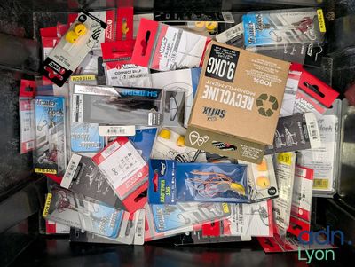 a box full of different types of electronic gadgets
