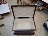 an open suitcase sitting on the floor in a room