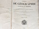 an open book with a picture of a map on it