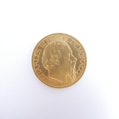gold coin on a white background with a portrait of a man