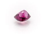 a pink tourmaline gems on a white background