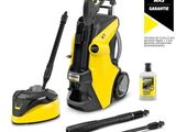 a yellow and black pressurer and cleaning kit on a white background