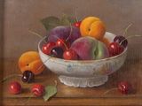 tableau représentant un bol de cerises et de pêches posé sur une table
