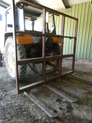 a tractor that is parked inside of a building