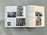 an open book with pictures of people on it