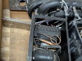 a box full of assorted items sitting on the floor