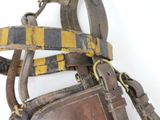 a brown bag with a yellow and black stripe on it