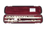 an image of a flute in a case on a white background