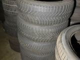 several tires stacked on top of each other in a warehouse