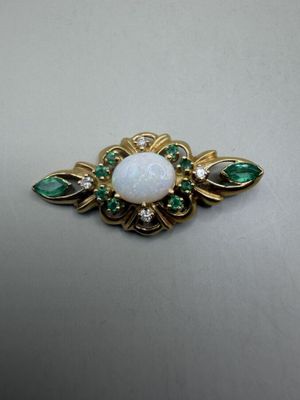 Pendentif en or jaune 750 millièmes ajouré serti d'un caboch… - Photo 1