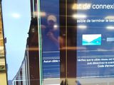 a television screen with a picture of a building on it