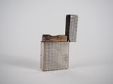 an image of a lighter that is sitting on top of a table