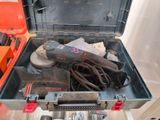 a tool box with tools inside of it on a table
