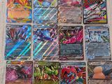 a bunch of pokemon cards sitting on top of a table