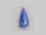 a close up of a blue tear shaped stone on a white surface