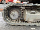 a close up of a tractor tire on the ground