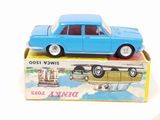 a blue toy car sitting on top of a box