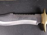 an image of a close up of a knife on a table