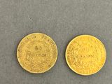 two gold coins, one of which is a sovereign and the other of which is a sovereign