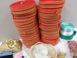 a table with many different types of sewing supplies on it