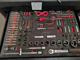 many tools in a tool box on the table